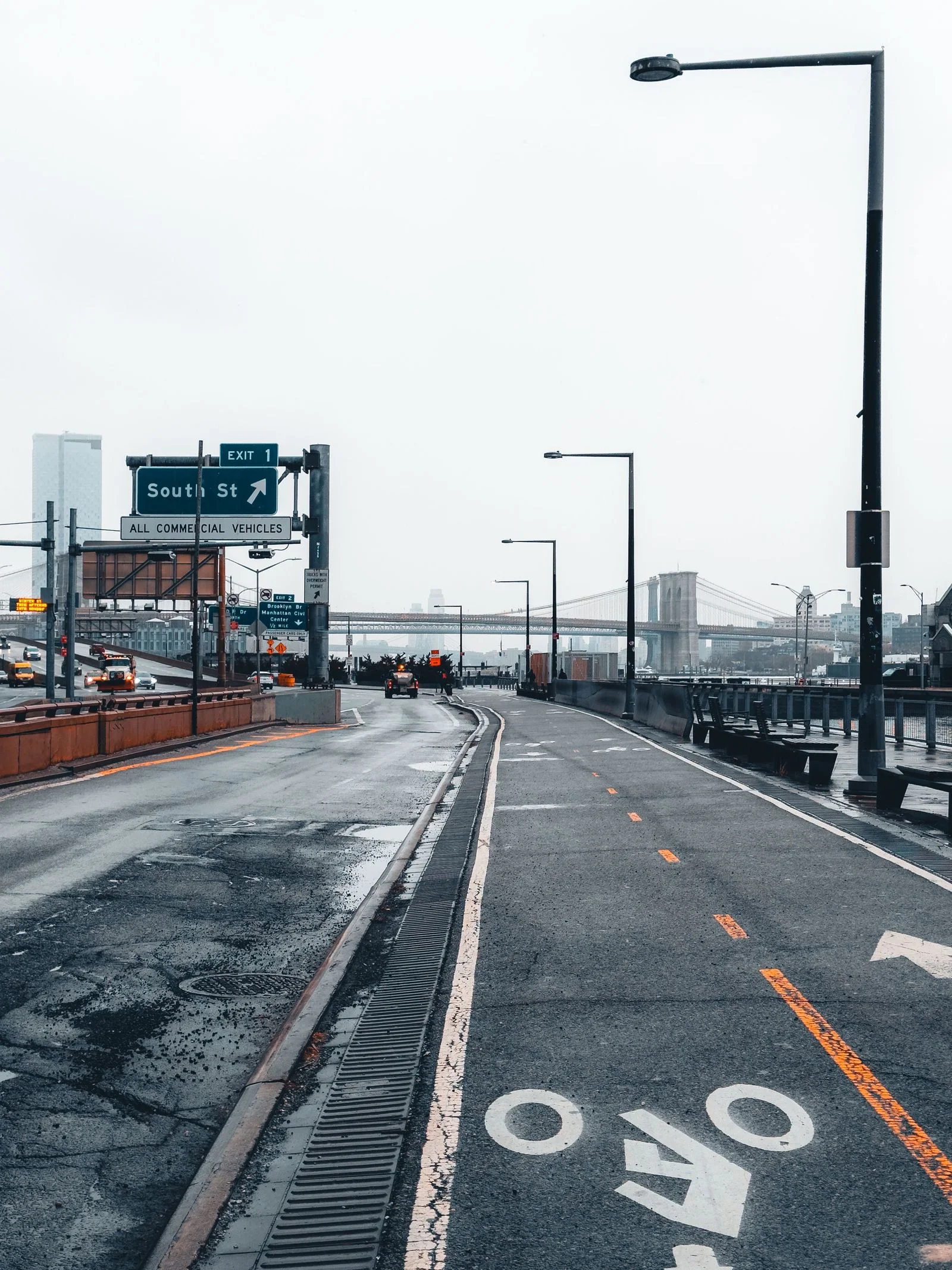 A New York bike lane with the Brooklyn Bridge in the background