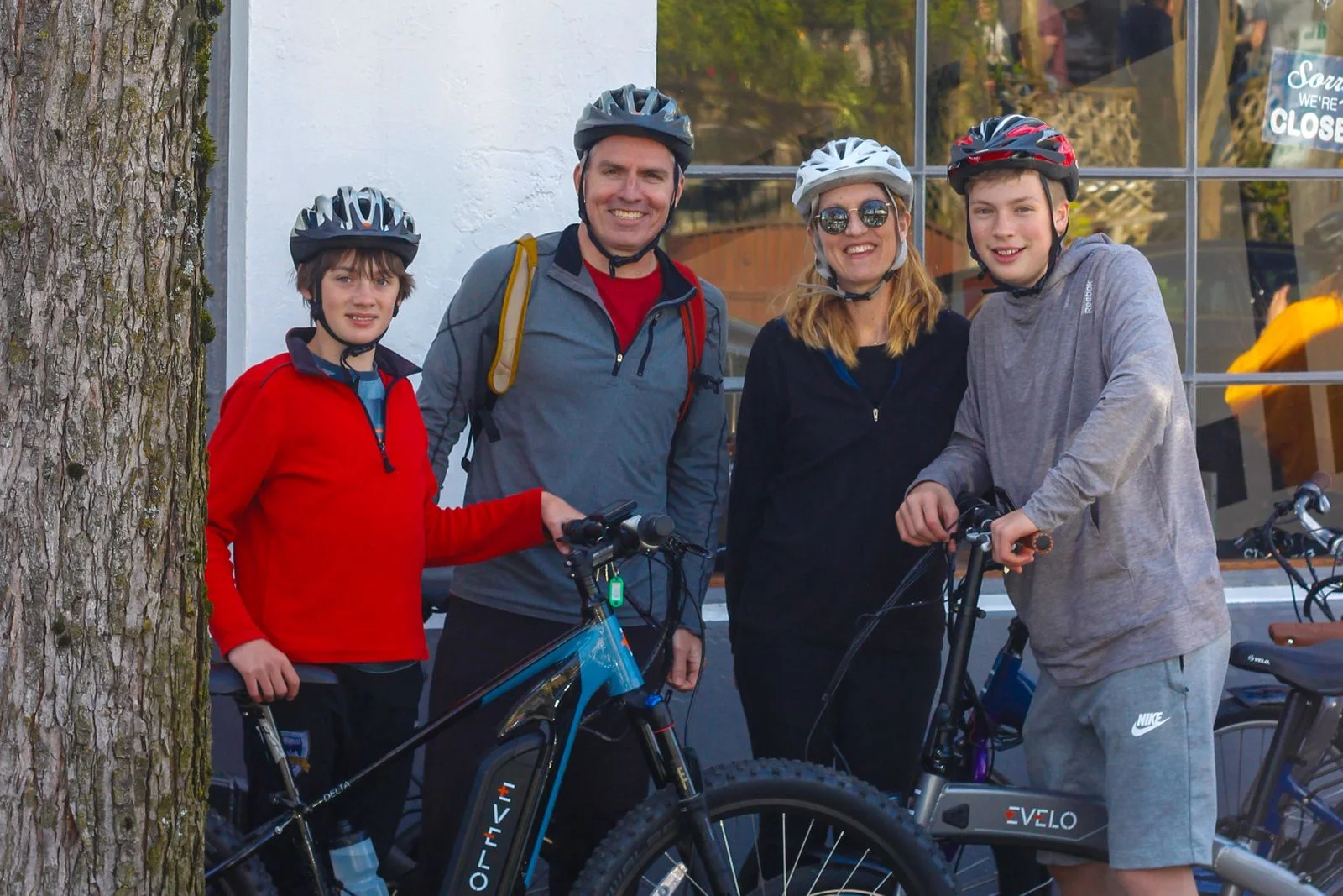 A family with electric bicycles