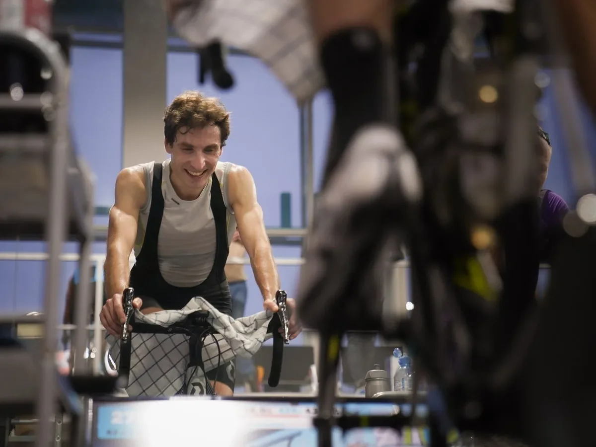 A cyclist training indoors